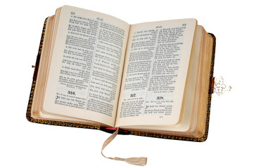 Open old Bible on white, with clipping path