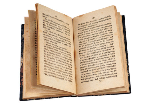 Open old Bible on white, with clipping path