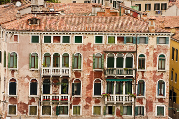 Ancient Red Stucco Apartment Building in Venice