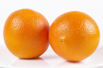 Two whole oranges
