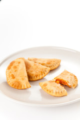 tasty tuna patty with tomato and pepper