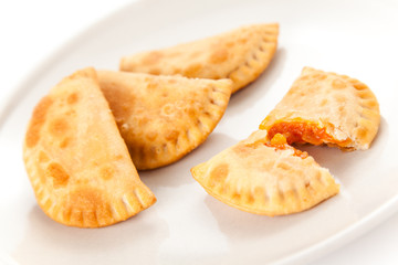 tasty tuna patty with tomato and pepper