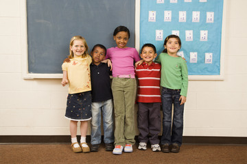 Students Standing in Classroom.