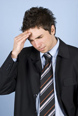 Young executive with headache
