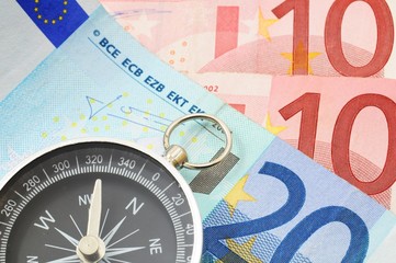 euro money and compass