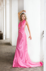 beautiful fashionable woman in pink dress