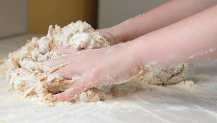 Child Kneading Bread Dough