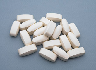 Tablets of Amino Acids on the Neutral Background