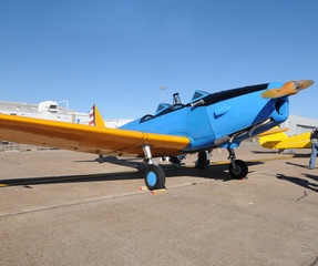 Fototapeta na wymiar Old blue airplane