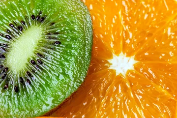 Crédence de cuisine en verre imprimé Tranches de fruits Parties de fond d& 39 orange et de kiwi par anneaux.