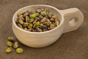 scoop of raw shelled pistachio nuts