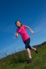 Girl running, jumping outdoor