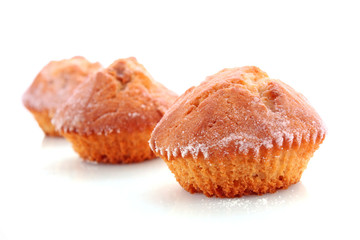 Three cupcakes on white background
