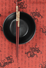 Oriental ceramic bowl and chopsticks
