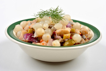 some fresh organic herring salad  in a bowl