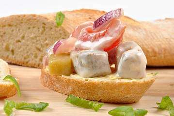 some fresh organic herring salad on bread