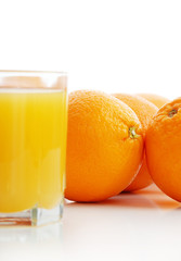 Orange juice and oranges