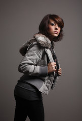 Fototapeta na wymiar young fashionable woman wearing a jacket