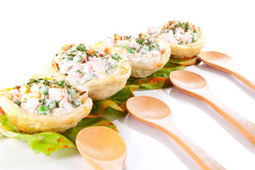 salads in tortilla and spoons