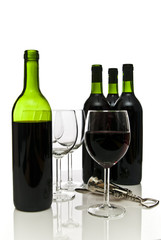 bottles of red wine and wineglasses