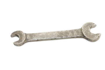 Old rusty spanner isolated on white background