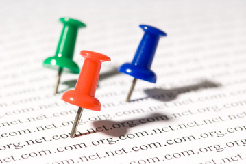 Push-pin in Newspaper