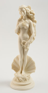white Aphrodite statue isolated on black background