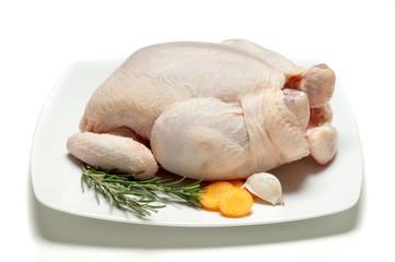 pollo con ingredienti per la cottura