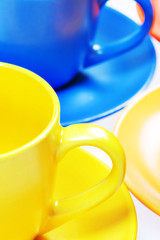 Color cups isolated on white background.