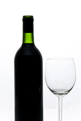 bottle of wine and wineglass isolated on white background