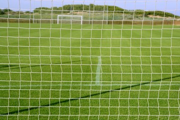 Net soccer goal football green grass field