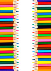 Coloured pencils on white background