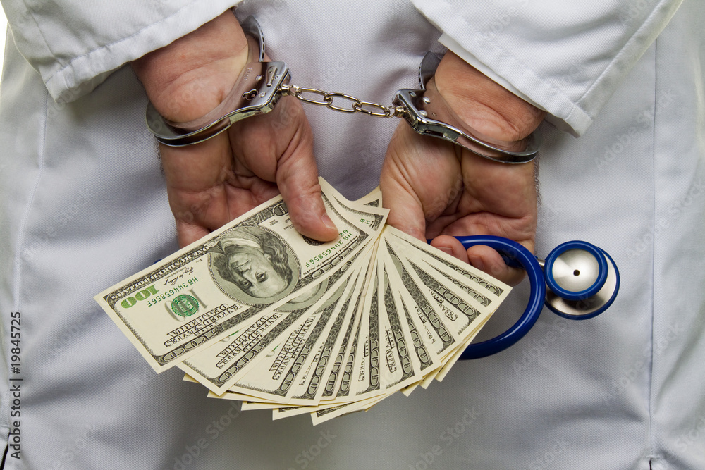 Wall mural Doctor with dollar bank notes and handcuffs - Wall murals