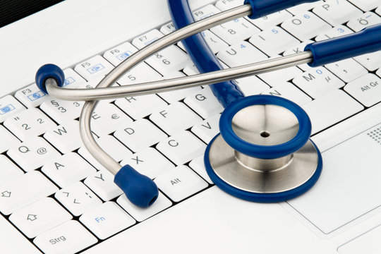Stethoscope on laptop. Data security on the Internet.