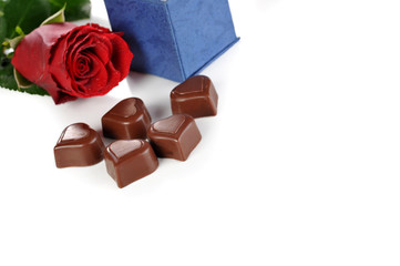 rose and  gifts in box