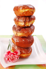 tower of donuts isolated on white