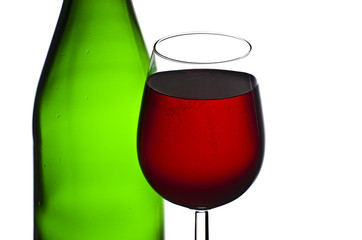 Bottle and glass of red wine isolated on white background