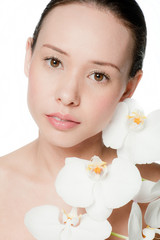 Young and attractive woman with flowers