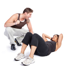Fototapeta na wymiar Exercise woman with trainer