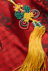 Traditional lucky knot on Jin-Silk background.