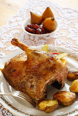 Roasted duck with baked potatoes