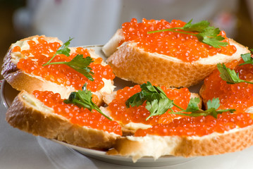 Sandwiches with red caviar.