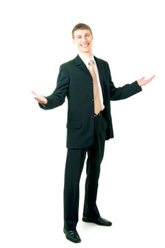 young smiling businessman greeting, isolated on white