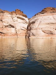 Fototapeta na wymiar Reflection of Rocky Cliffs in Water