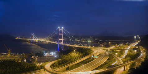 Fototapeta na wymiar A magical evening of Hong Kong Tsing Ma Bridge .