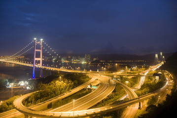 Fototapeta na wymiar magical evening of Hong Kong Tsing Ma Bridge .