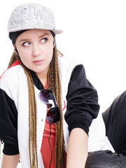 teen girl sitting and looking left over white background