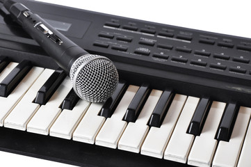 A microphone lying on the keys