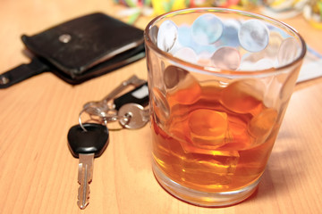 whiskey car keys and euro money