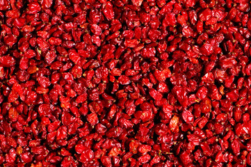 Red raisins isolated on the white background